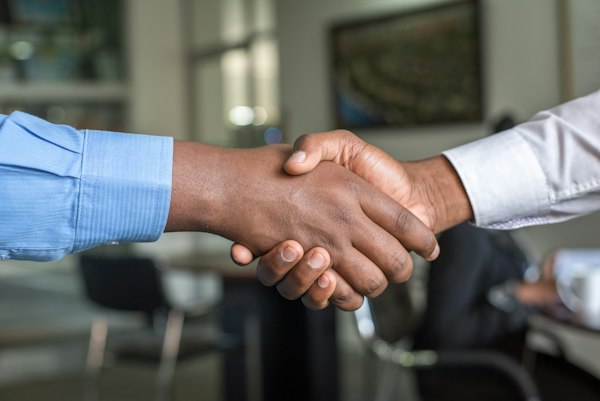Handshake with happy home seller